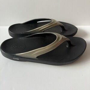 OOFOS Women's 10 Gold Black Flip Flop Thong Sandals Size W10/EU 41